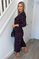 Plum And Black Printed Belted Long Sleeve Jumpsuit