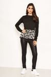 Long Sleeved Animal Print Peplum Top